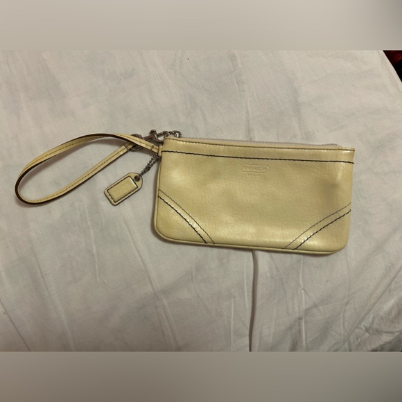 COACH cream parent wristlet. USED - Picture 2 of 4